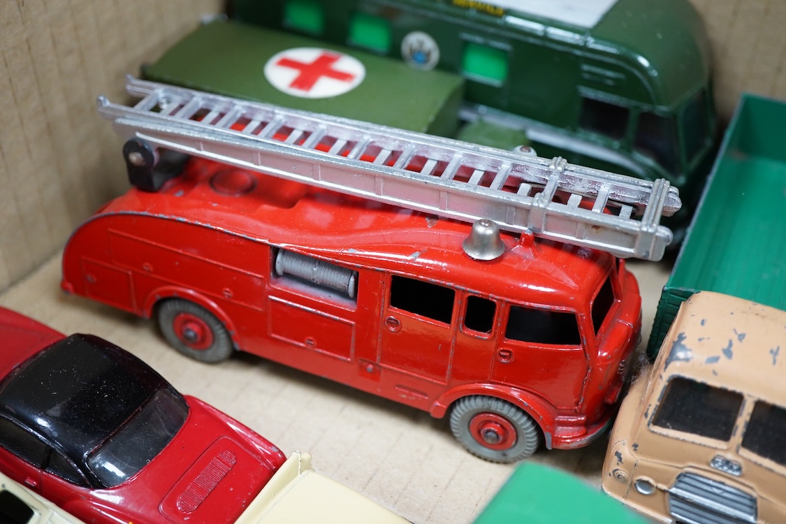 Twenty-five Dinky Toys including; Foden FG wagon, Leyland octopus wagon, TV mobile control room, Ford Zephyr, Volkswagen Karmann Ghia, Desoto Fireflite, Austin Healey 100, Hillman Minx, etc.
